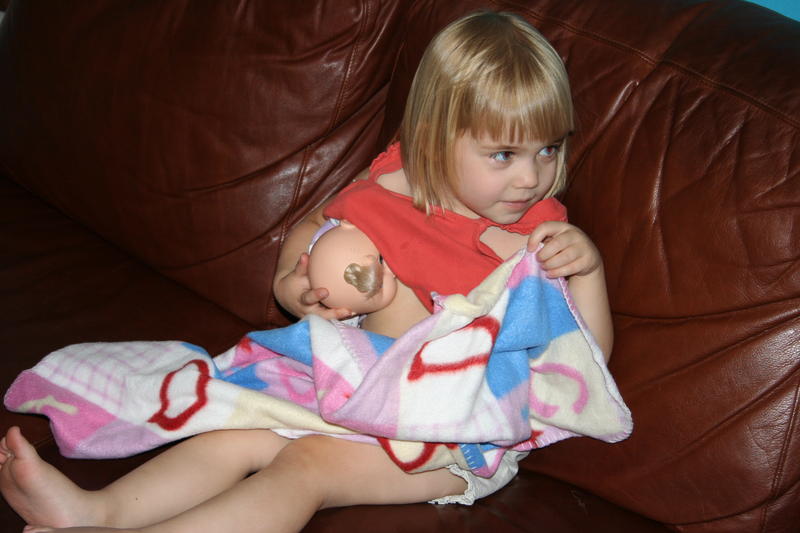 Ali nursing baby