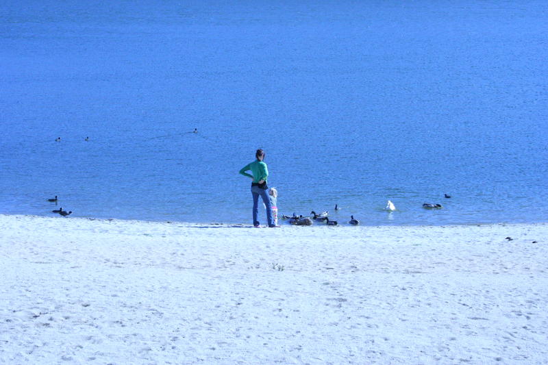 Becca and Ali feeding ducks