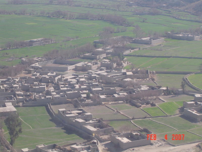 An Afghan town in a lush valley